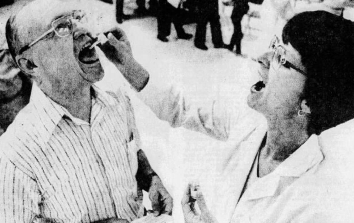 man getting polio vaccine, 1979